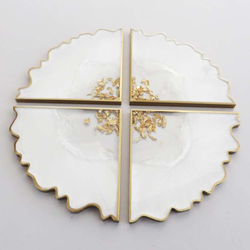 White and gold quad coasters